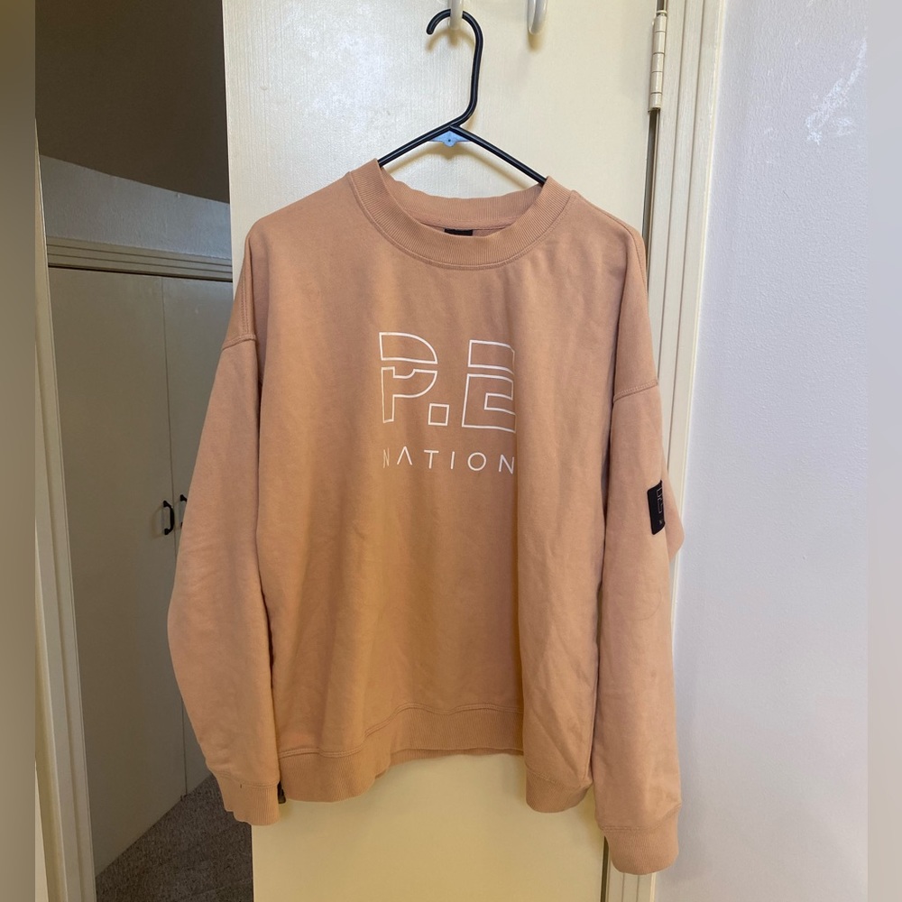 P.E Nation Heads Up Sweat in Maple